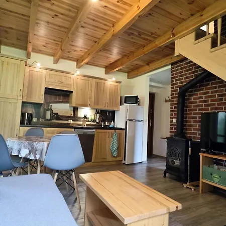 Деревянный коттедж Letniskowe Yaga Вилкасы